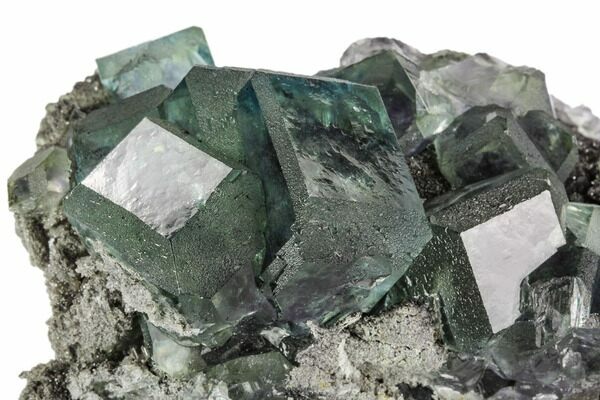 Glassy, dodecahedral fluorite crystals from China.